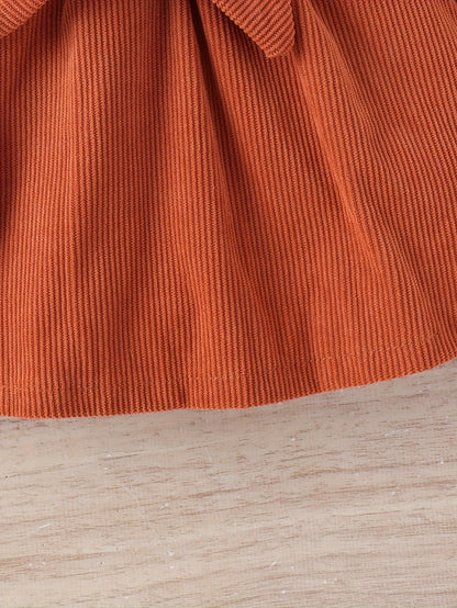 Buy this baby winter dress and hat set in mustard yellow and receive a pair of shoes and a hat as a gift.